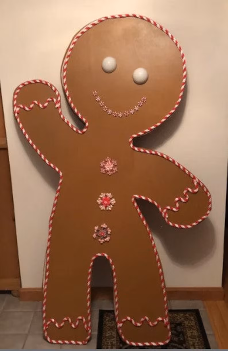 A wooden Christmas yard decoration gingerbread man you can learn to make.