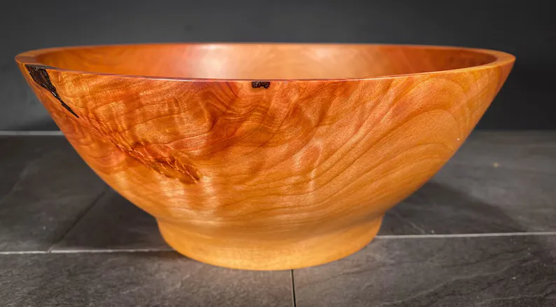 A very smoothly finished handturned birch wood bowl.