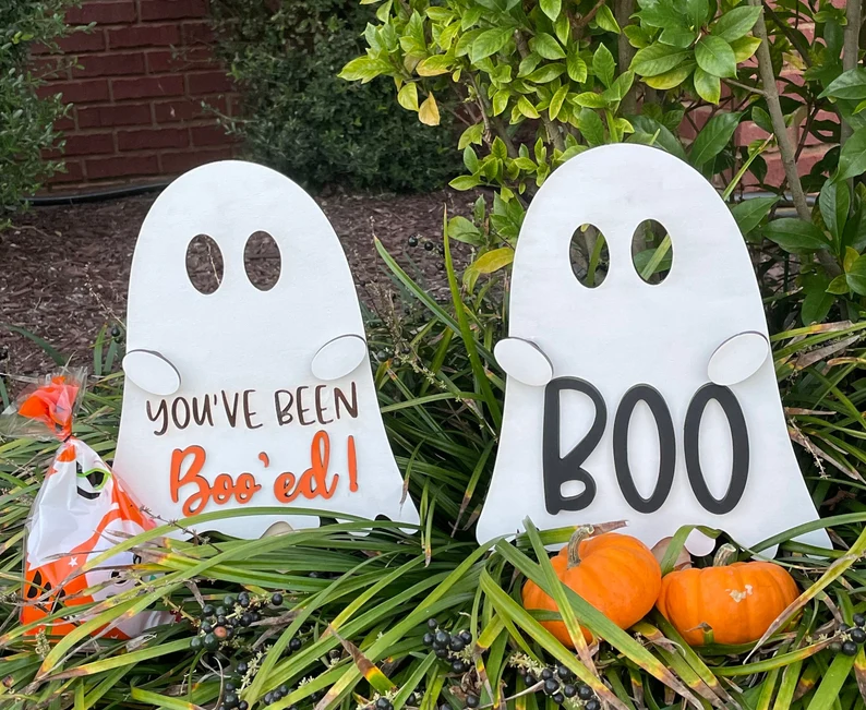 A cute picture of what you can make with these SVG patterns, of two ghost saying "BOO" and "You've been boo'ed!"