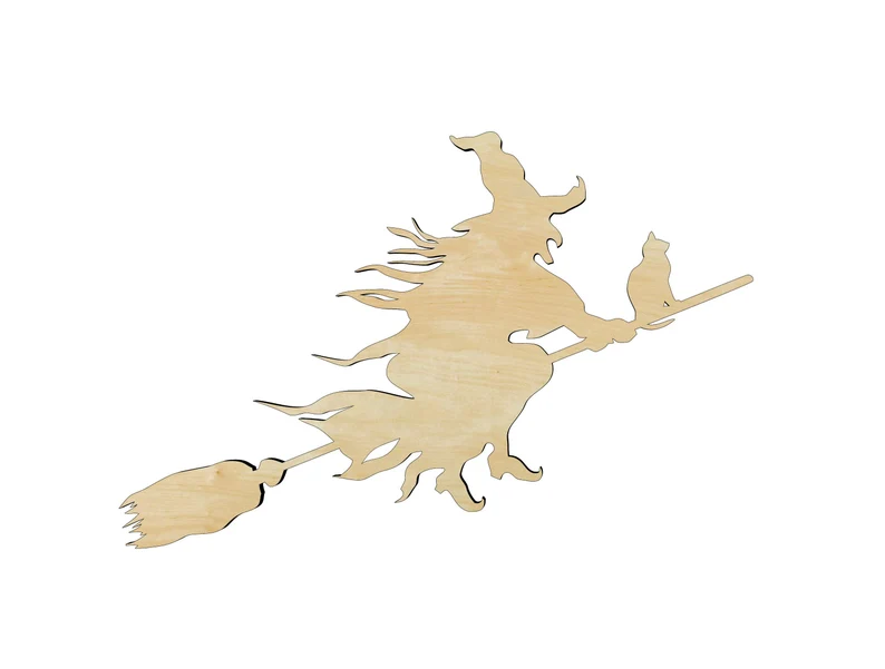 A witch on a broomstick cutout.