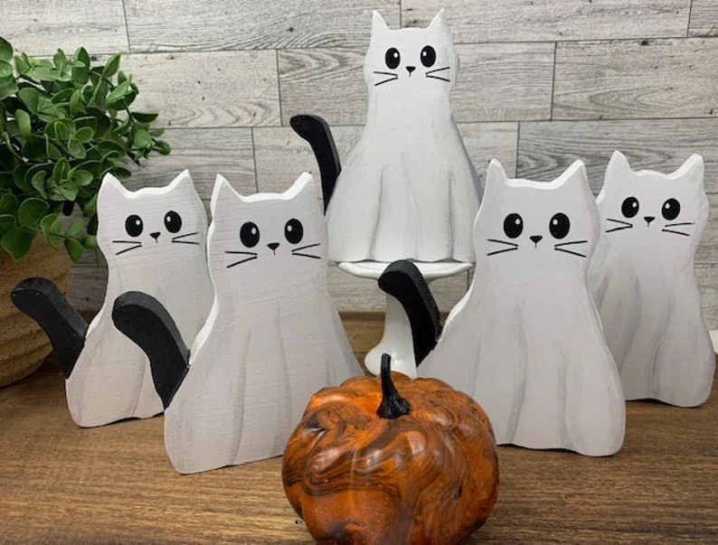 A picture showing the ghost cats shelf sitters.