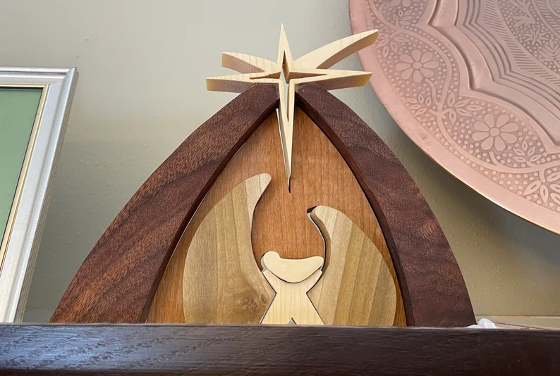 A beautiful Silent Night Away in a Manger scene you can learn to make from wood.